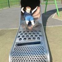 kid-on-shredder-shaped-slide.jpg